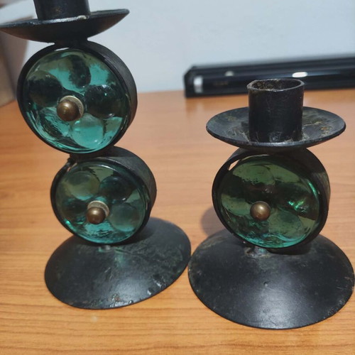 Old candle holders used, metal and glass
