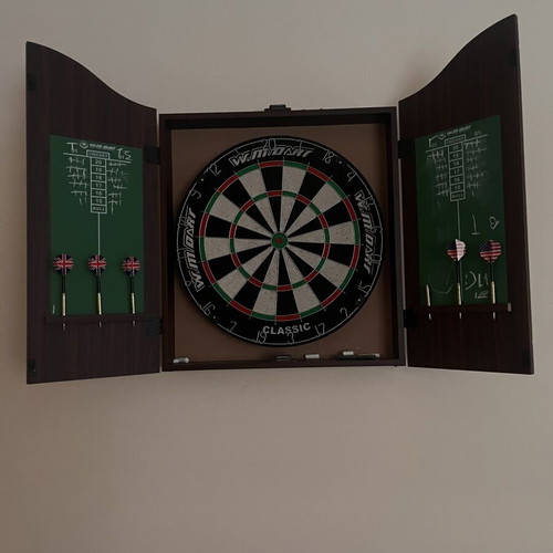 Luxury dartboard with cabinet like new