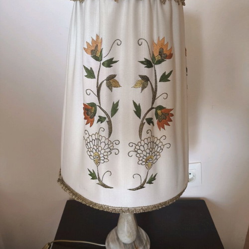Vintage table lamp with embroidered fabric shade used
