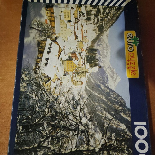 Puzzle used 1000 pieces with snowy city theme