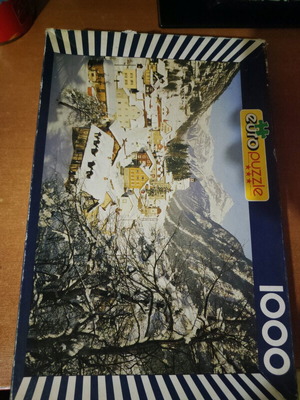 Puzzle used 1000 pieces with snowy city theme