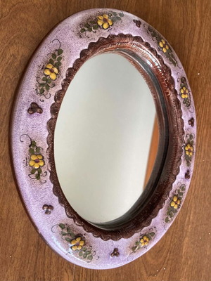 Mirror with ceramic frame used