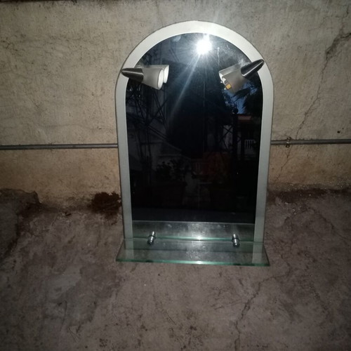 Semi-circular bathroom mirror used with 2 lights and shelf