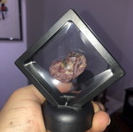 Raw large ruby 109ct in airtight display case