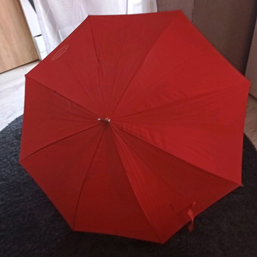 Clarins vintage umbrella used for collection or use