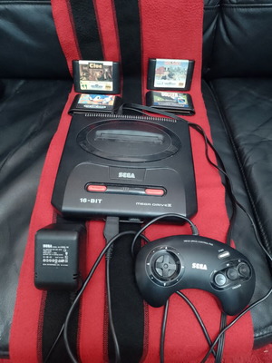 Sega Mega Drive II like new with 4 games and accessories