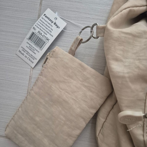 Backpack new beige with multiple pockets
