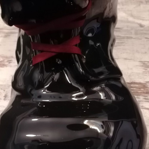 Vintage black boot-shaped planter like new