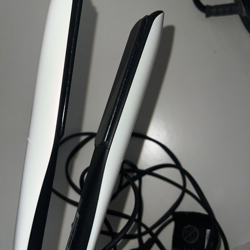 GHD Platinum+ hair straightener used for parts or repair