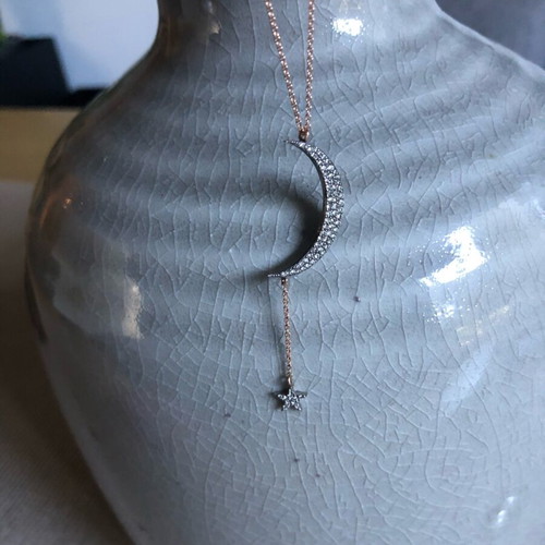 Moon and star necklace like new, pink gold with diamonds