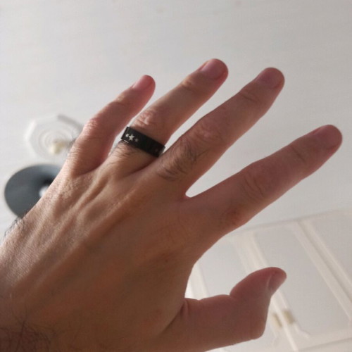 Stainless steel ring black with stars, like new, size 20