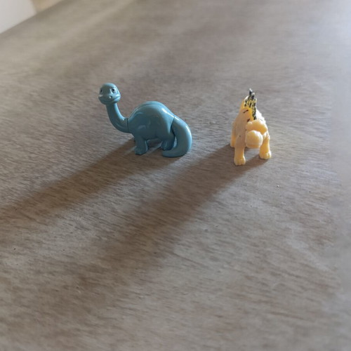 Dinosaur figures set of 2 used, including Kinder and Karambola