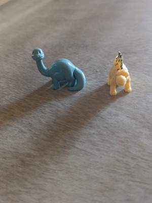 Dinosaur figures set of 2 used, including Kinder and Karambola