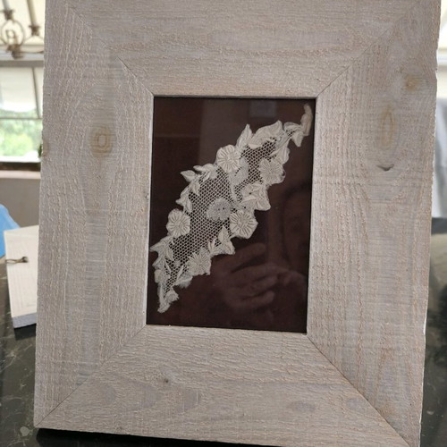 White wooden plank frame new, with vintage lace on velvet base