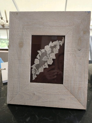 White wooden plank frame new, with vintage lace on velvet base