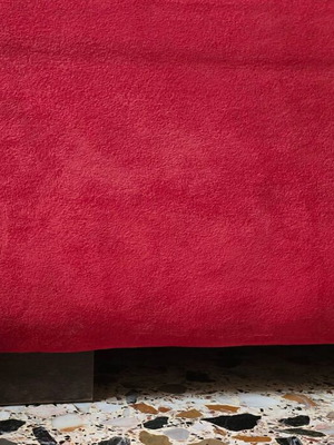Footrest for sofa like new, red, wooden legs, velvet cover