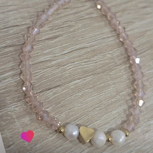 Handmade bracelet with crystals, pearls and heart-shaped coral made to order