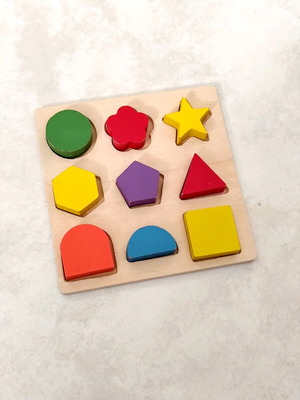 Wooden toy with shapes and colors like new