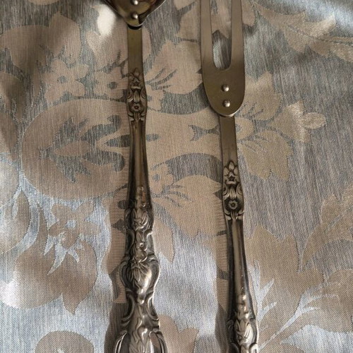 Vintage pierced spoon and fork set with ornate handle like new
