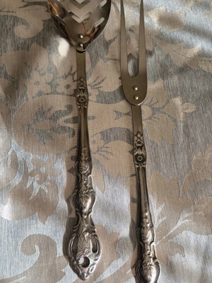 Vintage pierced spoon and fork set with ornate handle like new