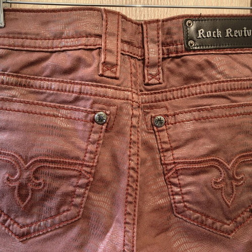 Rock Revival women's low rise red snake embossed denim jeans used