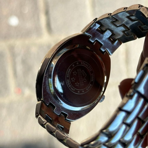 Christian D. Quartz watch with blue dial and metal bracelet