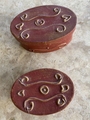 Pair of gift packaging boxes in soft brick color