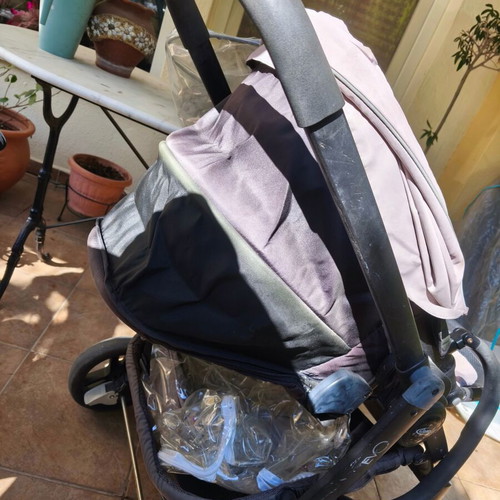 Evo Trio 3-in-1 stroller used with carrycot and car seat