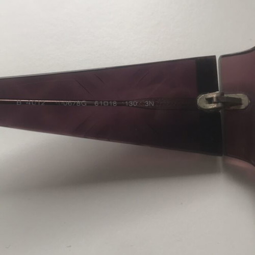 Burberry sunglasses and case used with minor defect