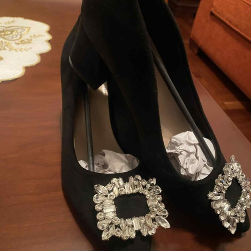 Black pumps with decorative buckle, new, size 41