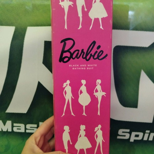 Barbie Mattel doll with black and white vintage bathing suit, new