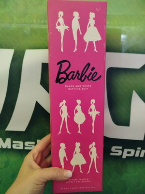 Barbie Mattel doll with black and white vintage bathing suit, new