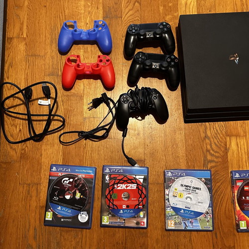 PlayStation 4 Pro 1TB like new with 3 controllers and 7 games