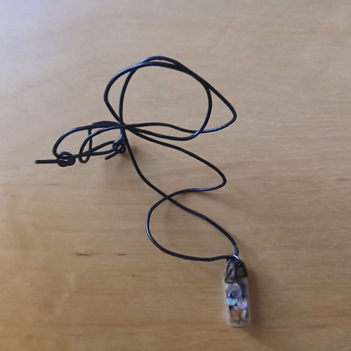 Necklace from Monaco unused with transparent container and colored stones