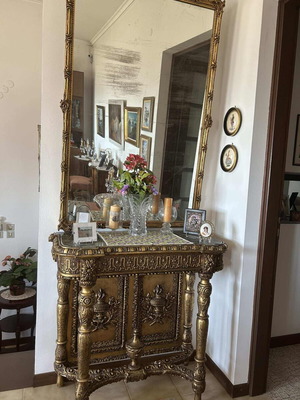 Carved gilded console with mirror and marble used