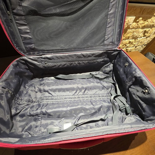 Carpisa 24" travel suitcase used, magenta color, semi-hard fabric