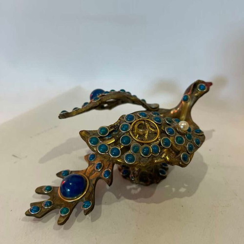 Vintage brass peacock ashtray with decorative stones used