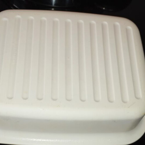 Tupperware cheese container used