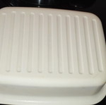 Tupperware cheese container used