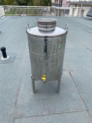 Stainless Steel Tank 100L like new with tap and inox base