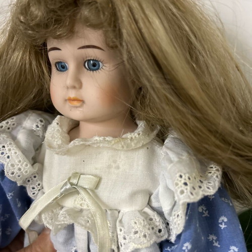 Porcelain doll Germany from the 70s like new