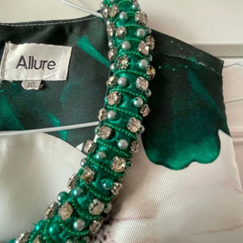 Allure dress like new, green with integrated rhinestone necklace, size M