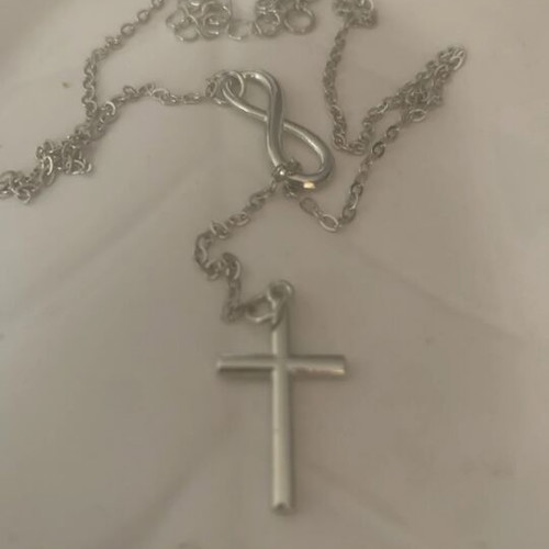 Steel necklace with cross and infinity symbol, new, silver color