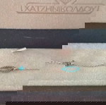  χρυσό βραχιόλι με μάτι και σταυρουδακι