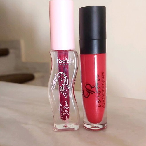 Lip gloss set with two new red lip glosses