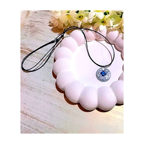 Handmade necklace with stainless steel iridescent silver motif and blue hematite cross