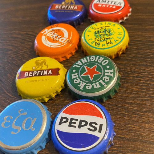 Beer and soda bottle caps used, set of 8, all Greek