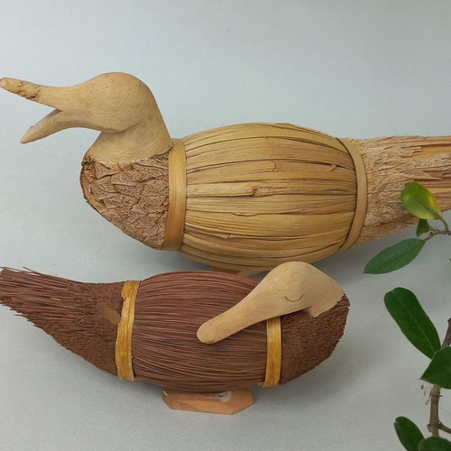 Set of handmade decorative wicker ducks used