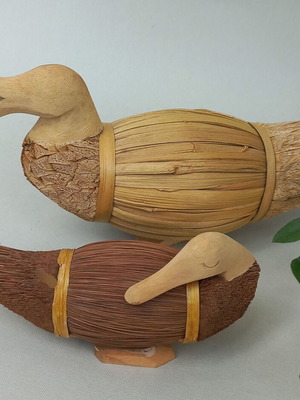 Set of handmade decorative wicker ducks used