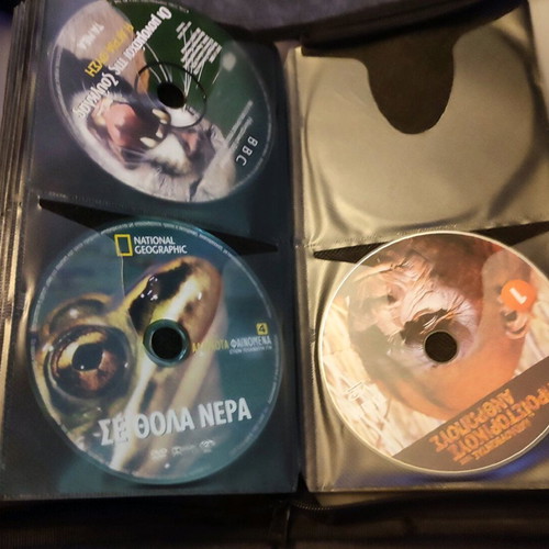 CD/DVD storage case used, 48 slots with zipper